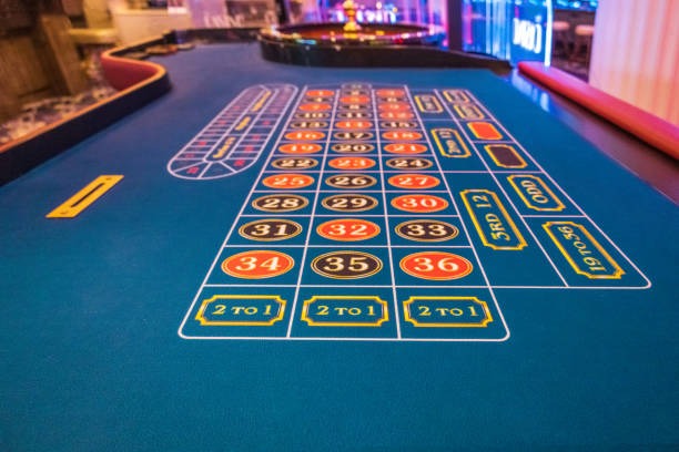 Roulette table with live dealer and betting controls kubet login roulette table with dealer and betting interface